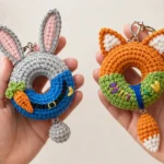 Finished bunny and fox donut keychain crochet pattern set held in hand