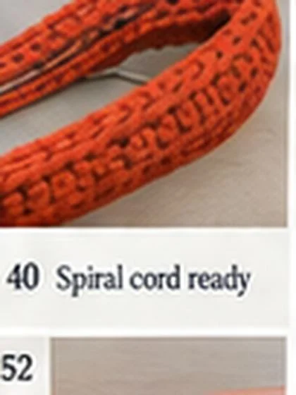 Spiral shell crochet handbag step 40: Begin coiling cord on spiral base.