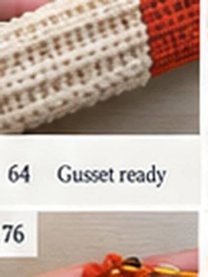 Spiral shell crochet handbag step 64: Reserve 21 top opening positions.